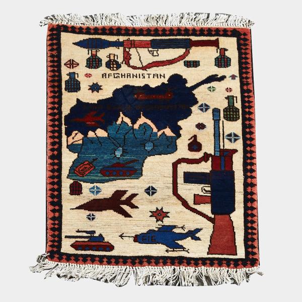 Appraisal: An Uzbek Embroidery together with a Afghan War Rug