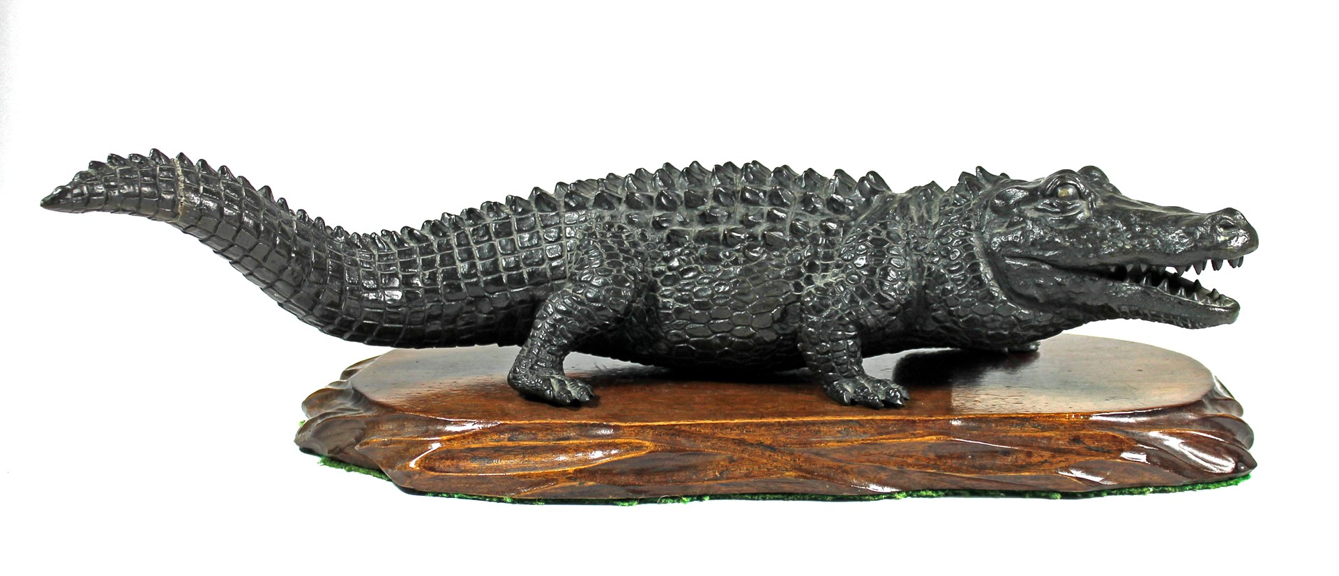 Appraisal: A Japanese bronze crocodile by Genryusai Seiya Meiji period naturalistically