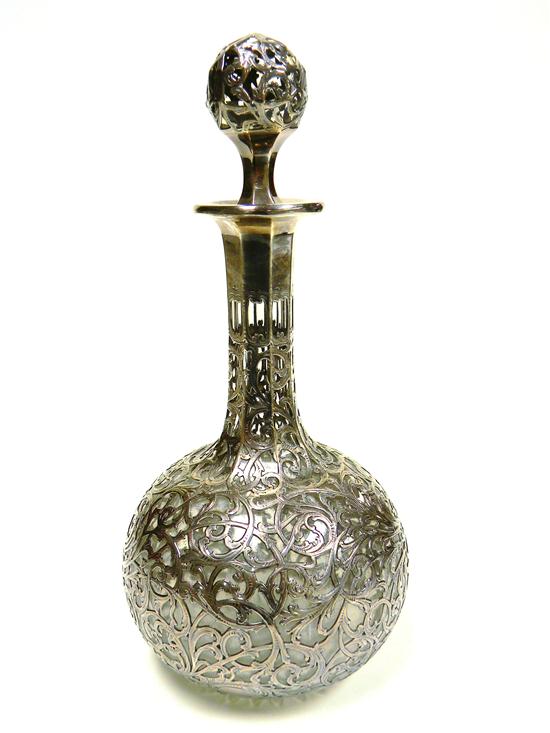 Appraisal: Glass decanter with elaborate silver overlay and ball stopper ''