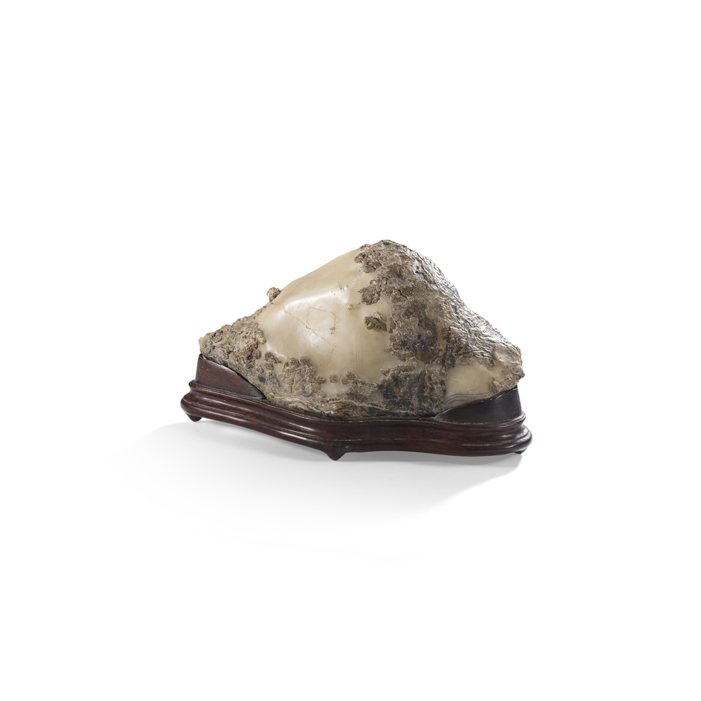 Appraisal: WHITE AGATE SCHOLAR'S ROCK of triangular shape the white agate