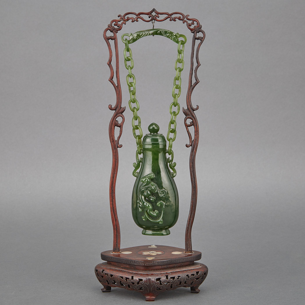 Appraisal: Chinese Spinach Green Jade Hanging Vase Of flattened pear shape