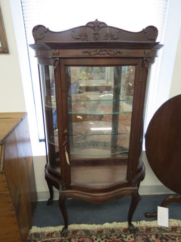 Appraisal: Carved Mahogany Vitrine Display Cabinet curved sides and bowfront tall