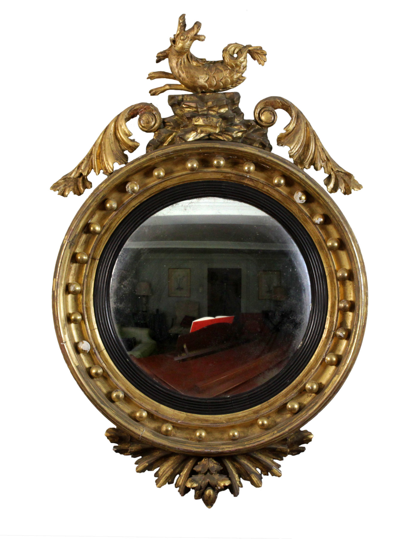 Appraisal: A Regency gilt wood mirror framed with seahorse surmount and