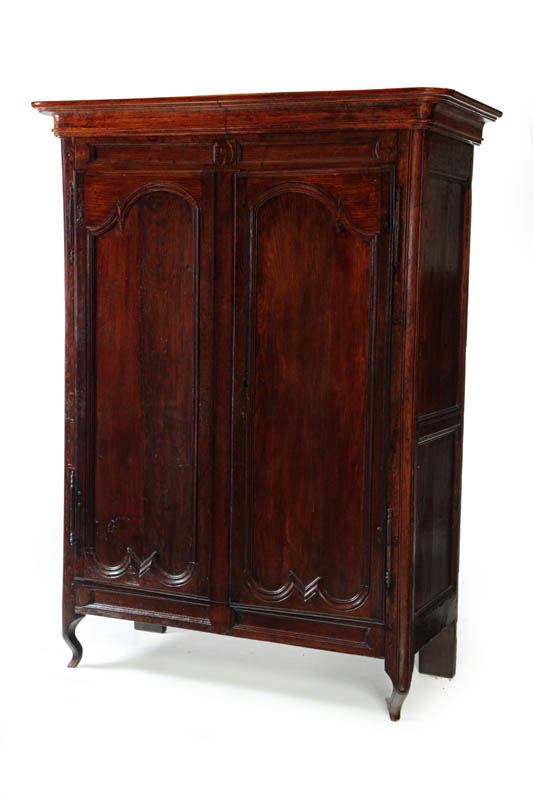 Appraisal: FRENCH PROVINCIAL ARMOIRE France th century oak and mixed woods