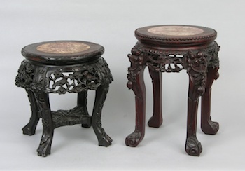 Appraisal: A Pair of Carved Rosewood Plant Stands One with carved