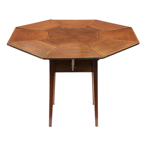 Appraisal: An Edwardian octagonal mahogany eight drop leaf centre table crossbanded