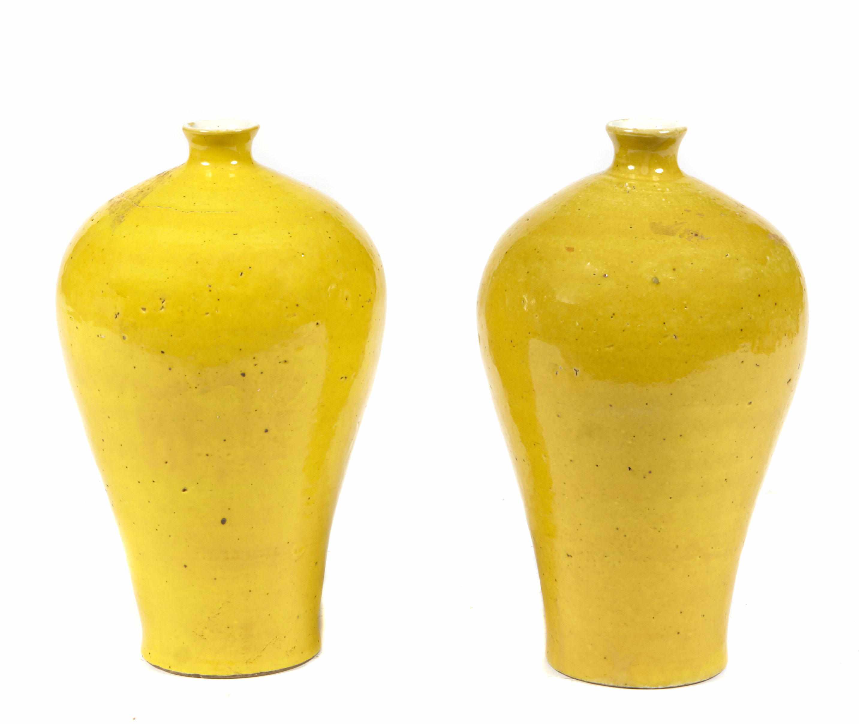 Appraisal: A pair of Chinese yellow glazed porcelain vases height in