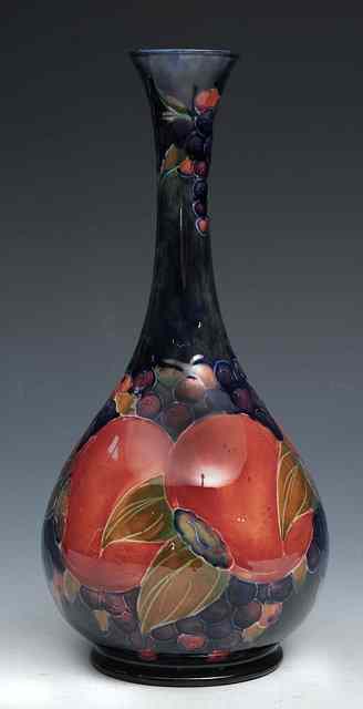 Appraisal: A William Moorcroft 'Pomegranate' baluster vase circa - green painted