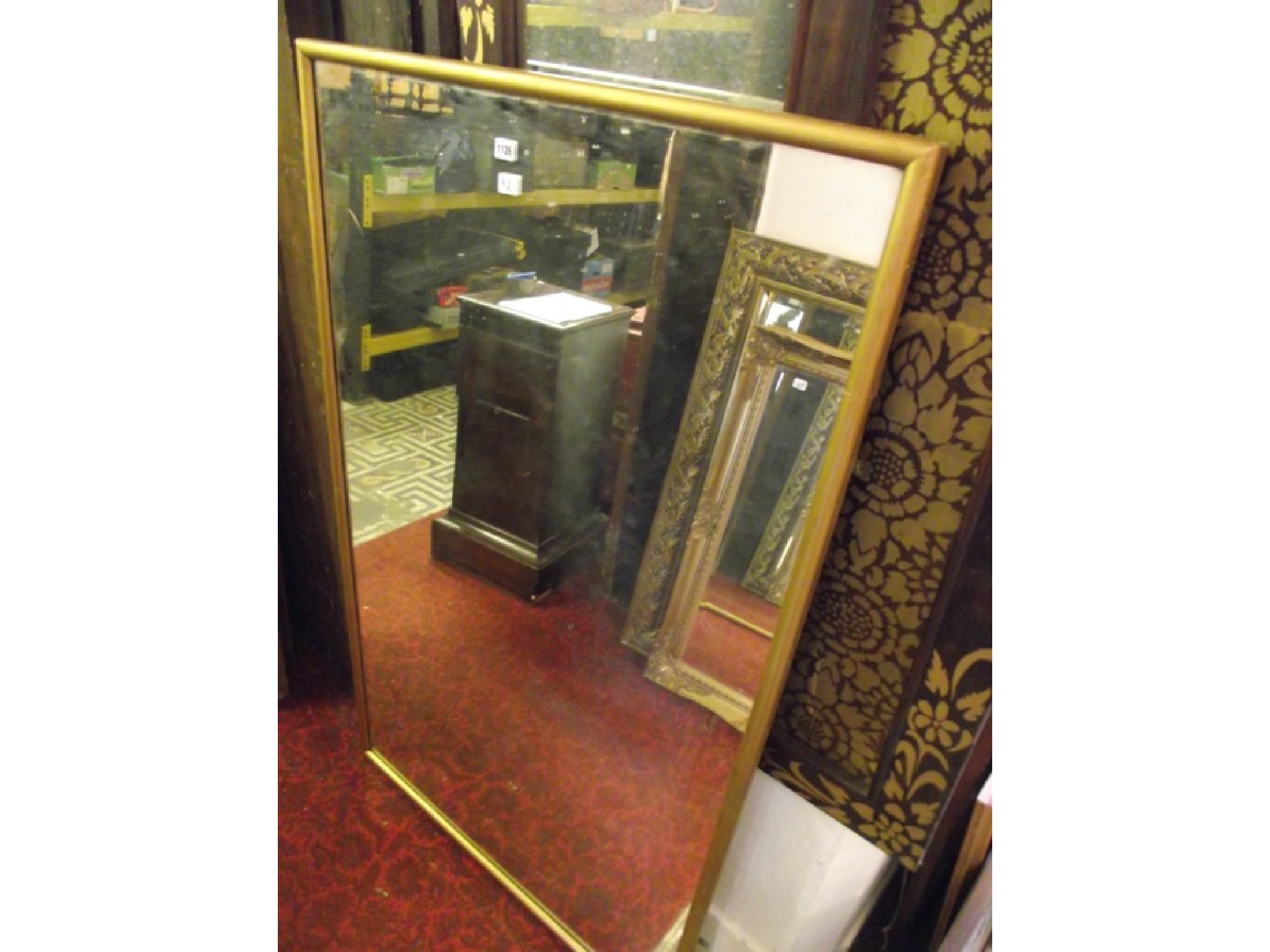 Appraisal: A large wall mirror of rectangular form with simple moulded