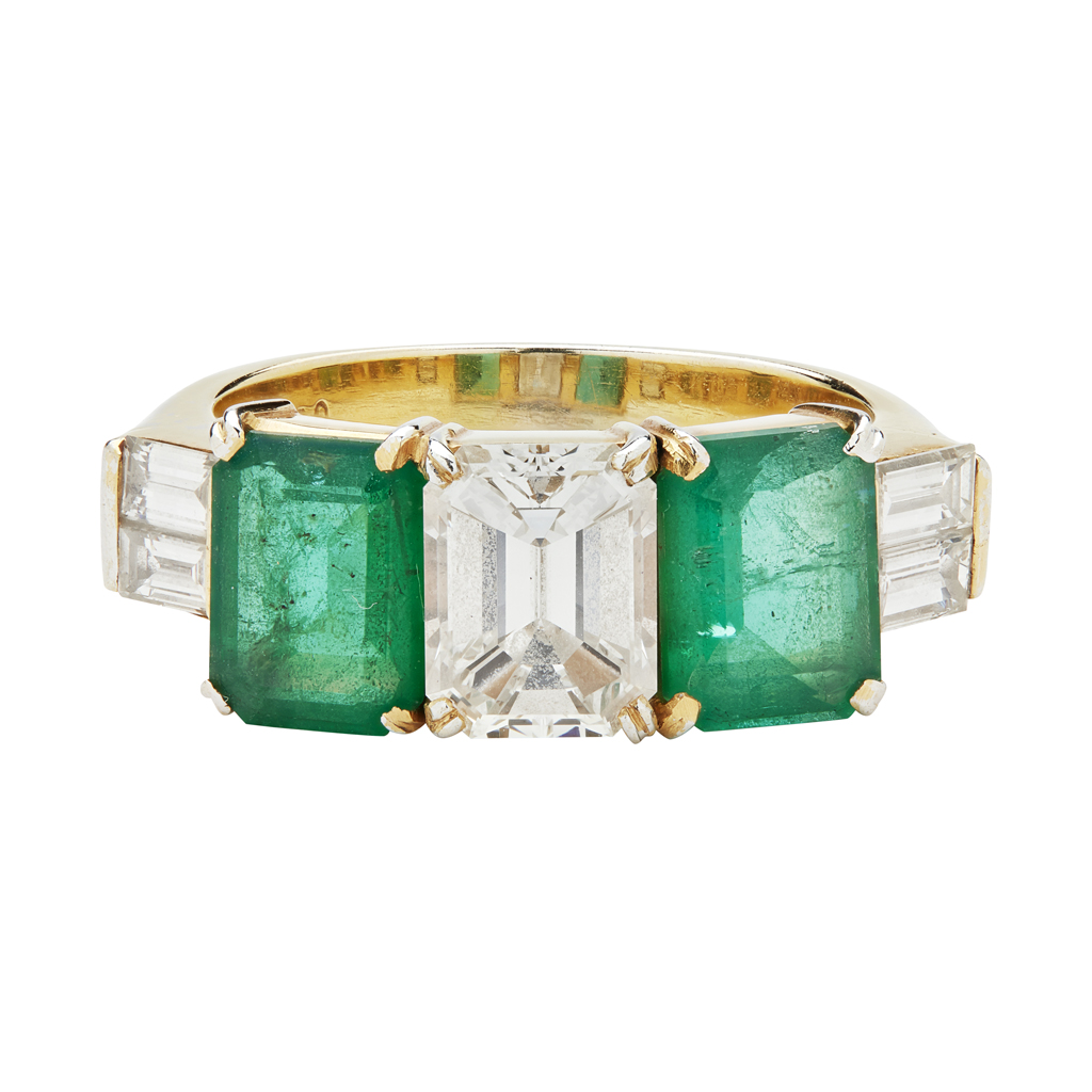 Appraisal: An emerald and diamond set ringclaw set with a central