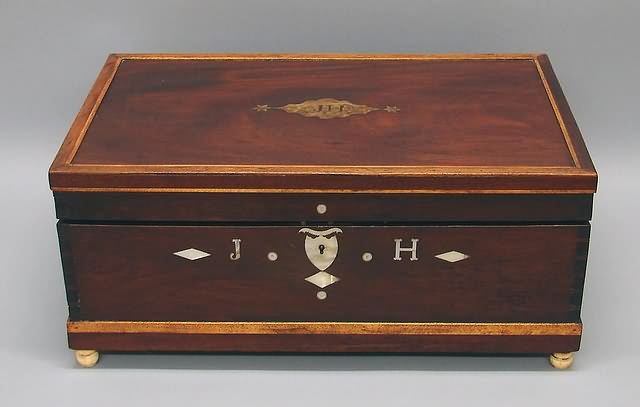 Appraisal: Line-inlaid mahogany with centering foil inlay marked JH folding writing