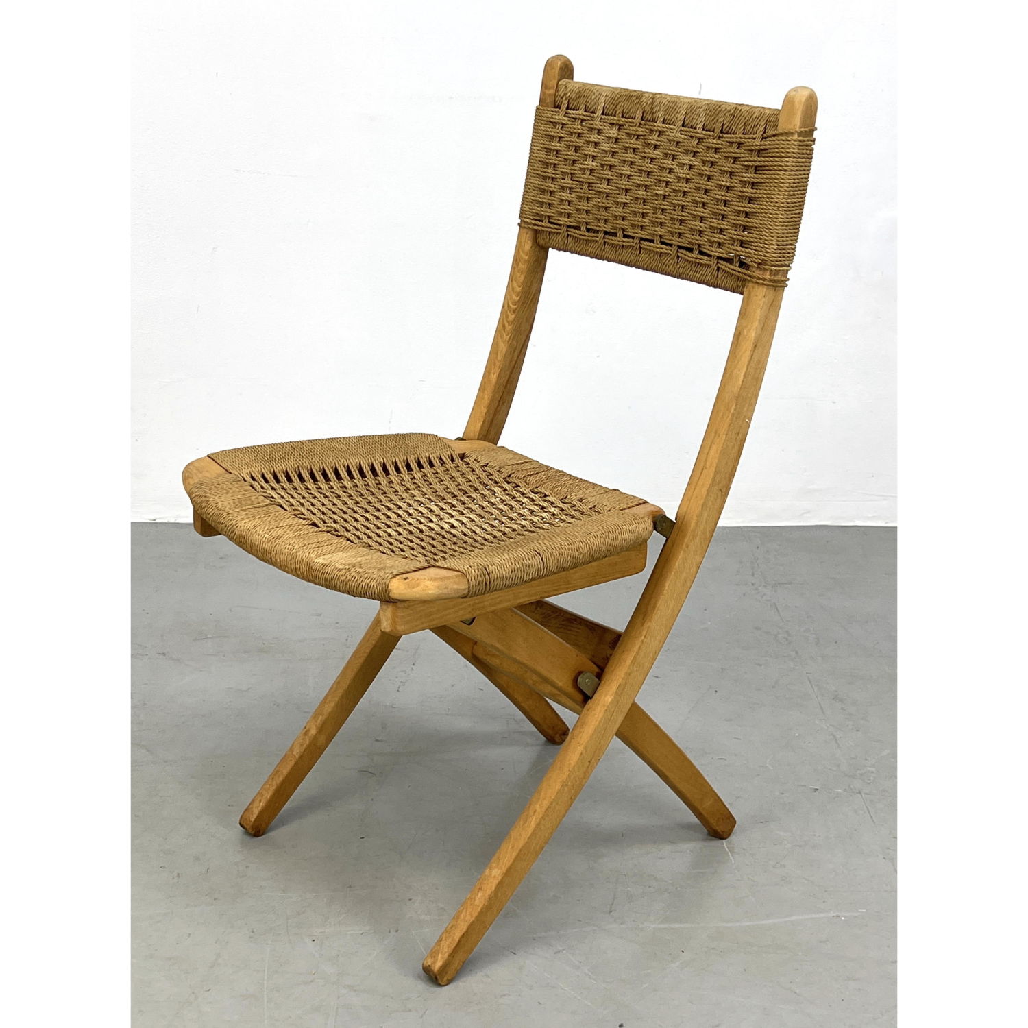 Appraisal: Single Hans Wegner style Folding Dining Chair Woven seat and