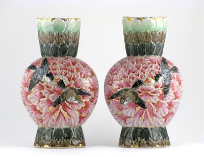 Appraisal: A pair of Chinese moulded vases the bodies as massive