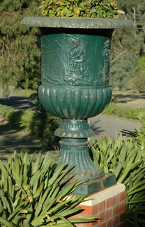 Appraisal: A SUBSTANTIAL PAIR OF REGENCY STYLE CAST IRON URNS Campana