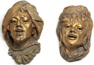 Appraisal: Pair of Cast Gold Depicting a tribeswoman and tribesman Longest