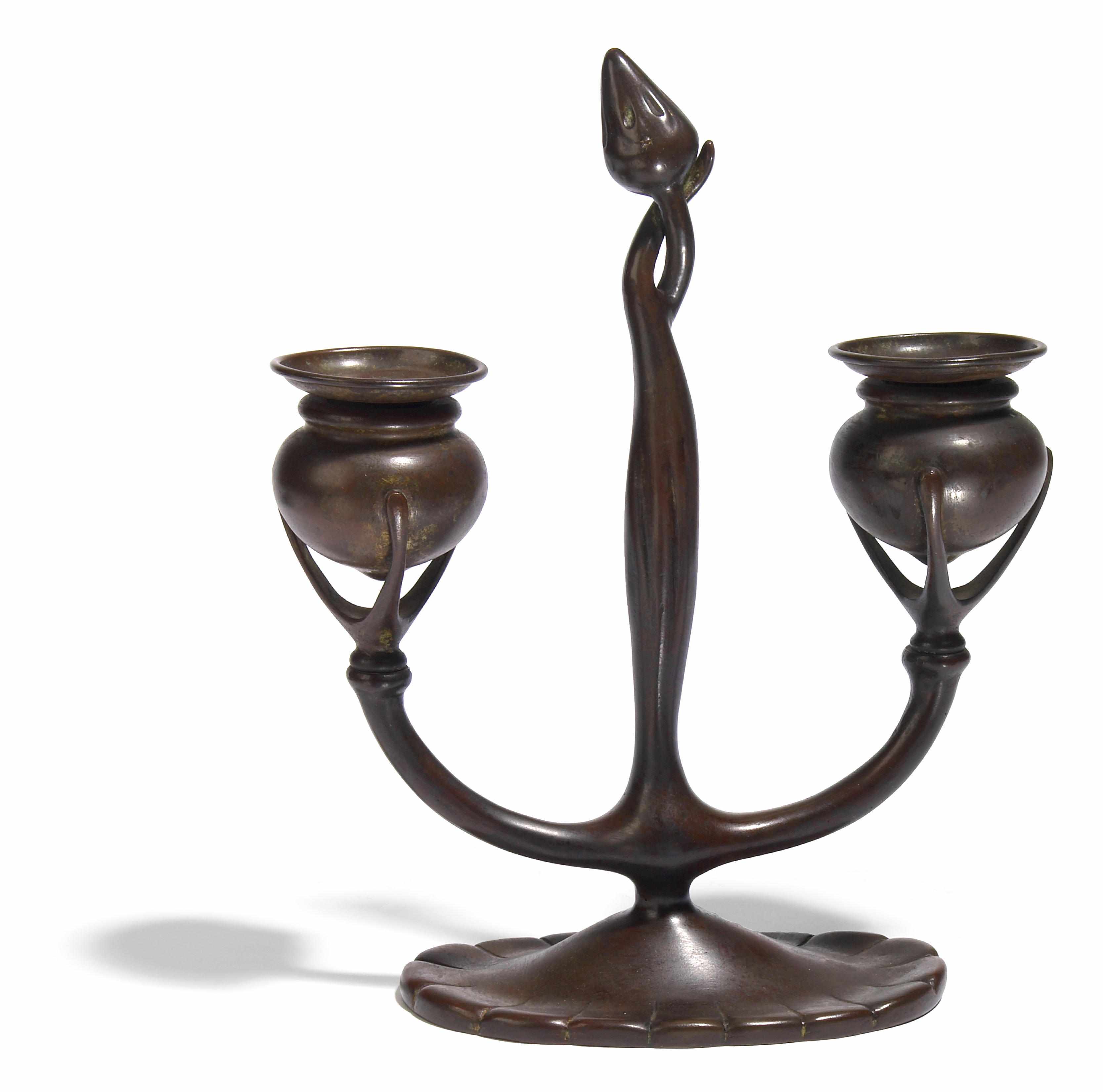 Appraisal: A Tiffany Studios bronze double arm candelabrum - faintly impressed