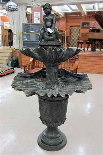 Appraisal: TWO-TIER PATINATED BRONZE GARDEN FOUNTAIN featuring a seated figure of