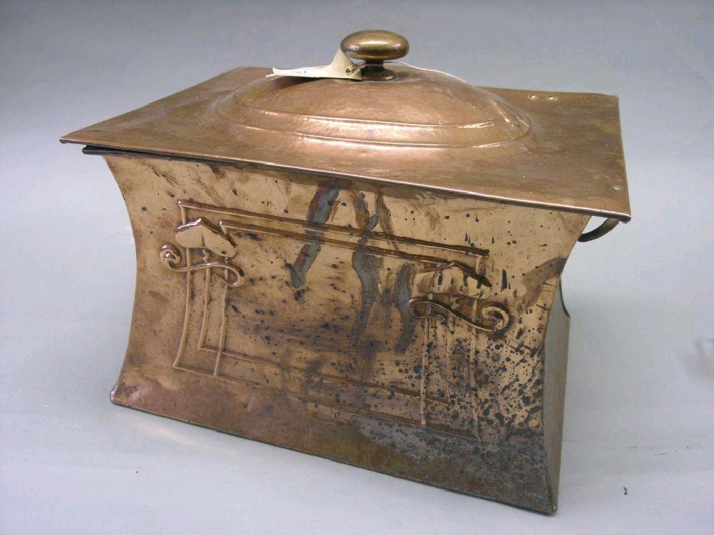 Appraisal: A hammered copper coal box embossed in Art Nouveau style