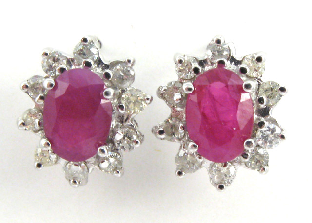 Appraisal: PAIR OF RUBY DIAMOND AND FOURTEEN KARAT WHITE GOLD EARRINGS