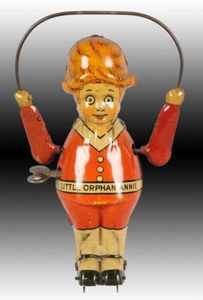 Appraisal: Marx Tin WInd-Up Little Orphan Annie Skipping Toy Description Working