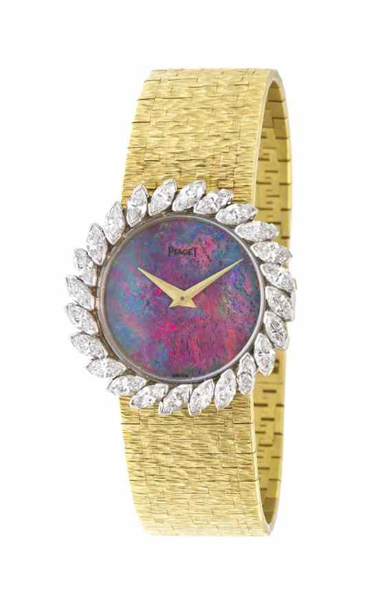 Appraisal: An Karat Yellow Gold Wristwatch Piaget mm case diameter opal