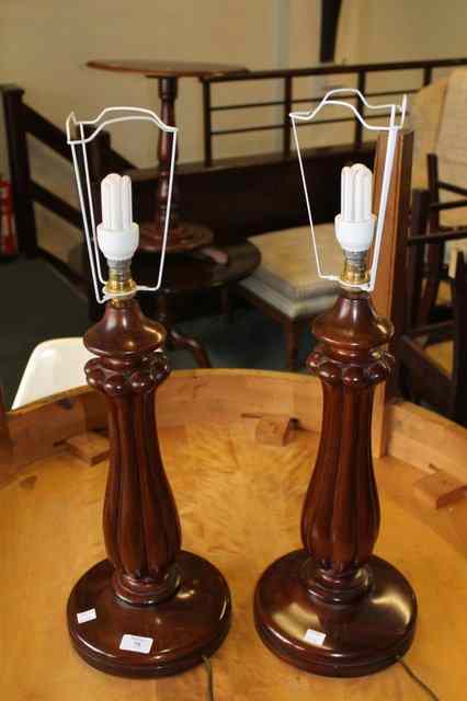 Appraisal: A PAIR OF MAHOGANY TABLE LAMPS Victorian and later high