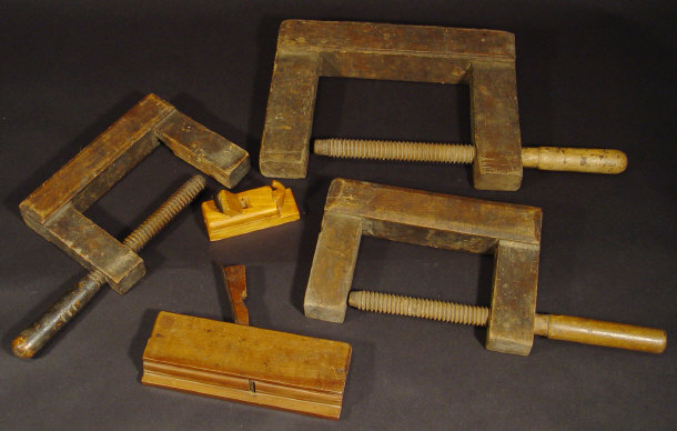 Appraisal: Three old wooden G-clamps and a small selection of moulding