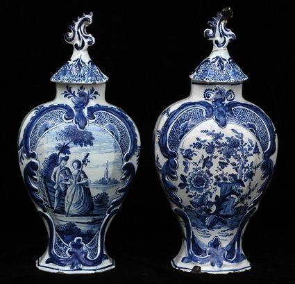 Appraisal: ASSEMBLED PAIR OF DUTCH BLUE AND WHITE DELFT JARS AND