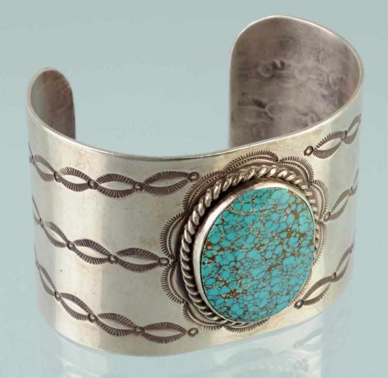 Appraisal: Native American Indian Silver Wide Bracelet Description With large turquoise