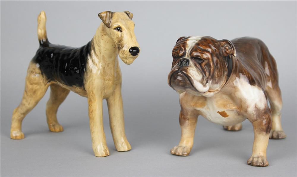 Appraisal: TWO ENGLISH PORCELAIN DOGS the first Royal Doulton Hn modeled