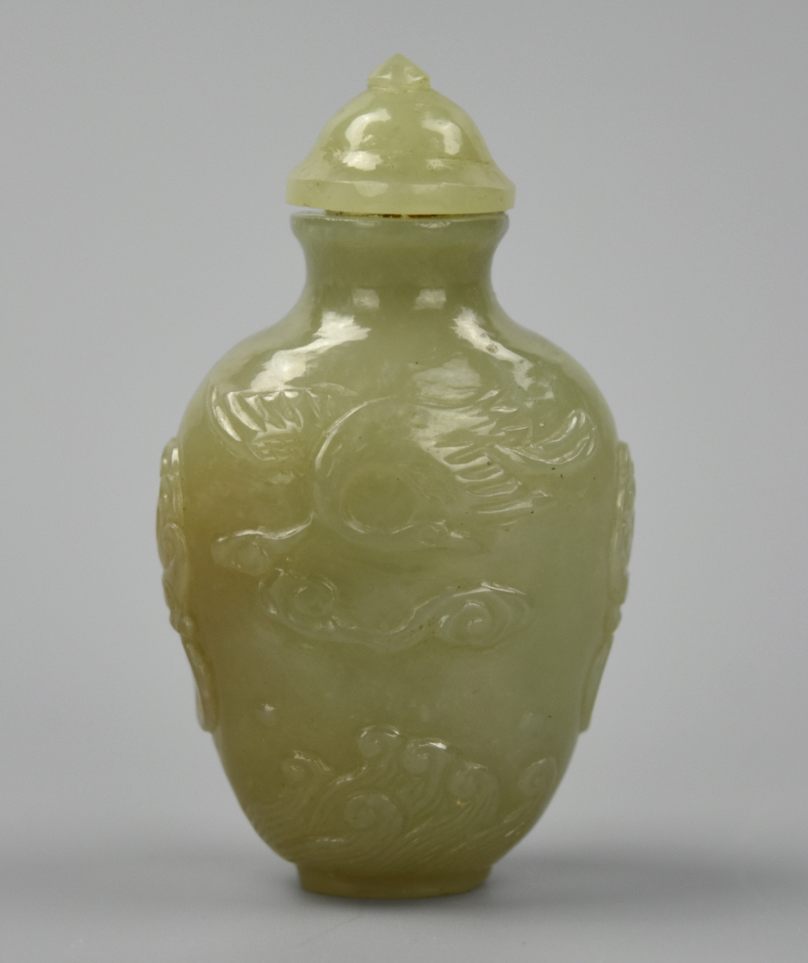 Appraisal: CHINESE CELADON JADEITE SNUFF BOTTLE QING D A celadon green