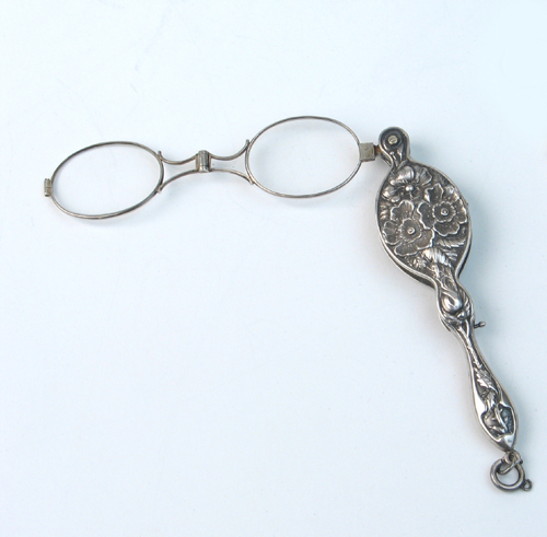 Appraisal: AN AMERICAN VICTORIAN STERLING SILVER LORGNETTE the case in floral