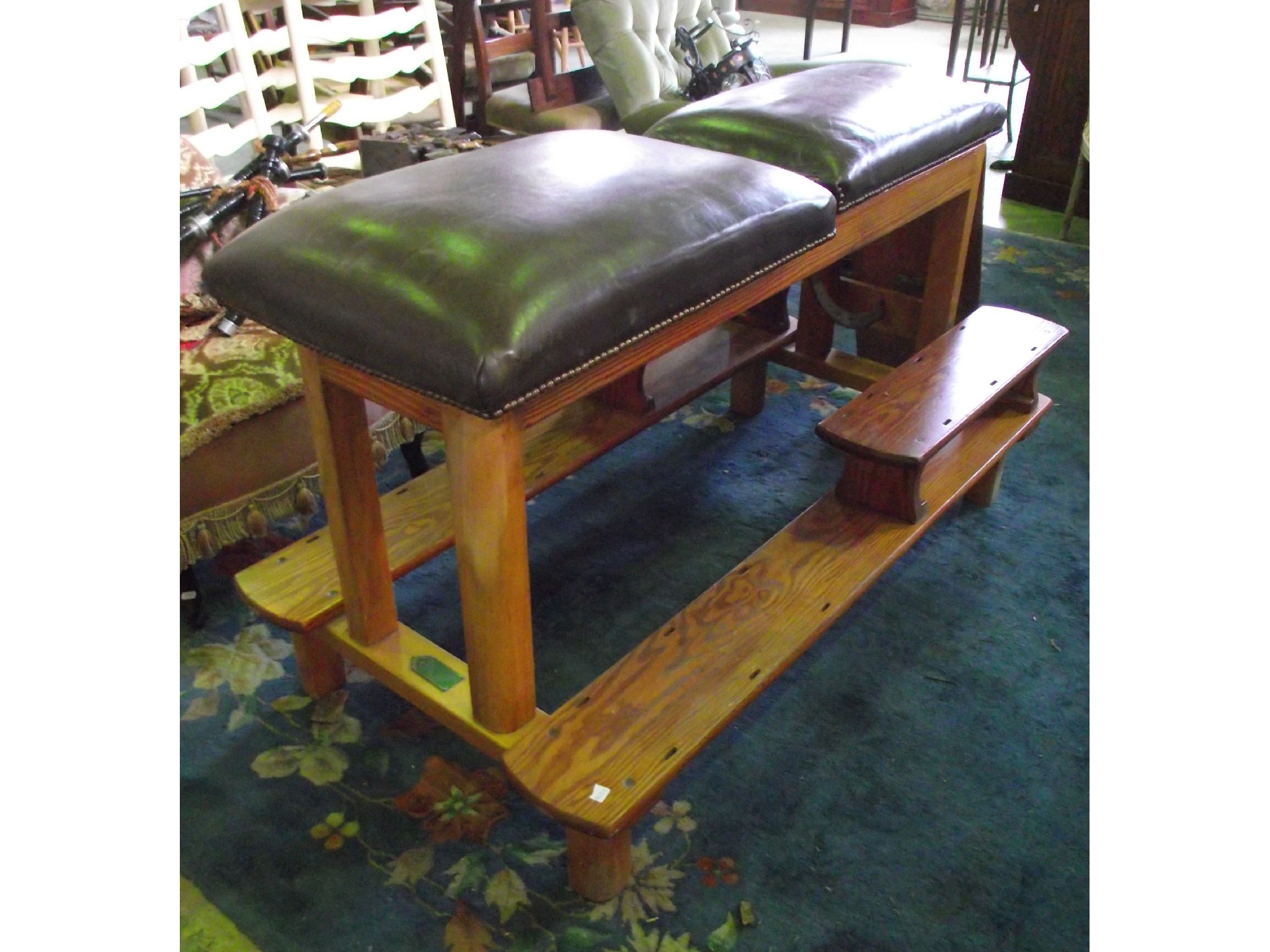 Appraisal: A light beechwood and pine framed examination table with adjustable