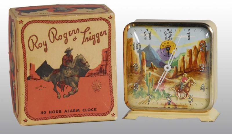 Appraisal: Tin Roy Rogers Animated Alarm Clock Description Made by Ingrahm