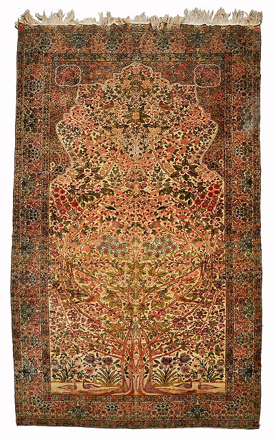 Appraisal: AN ANTIQUE KIRMAN RUG with a central pattern of birds