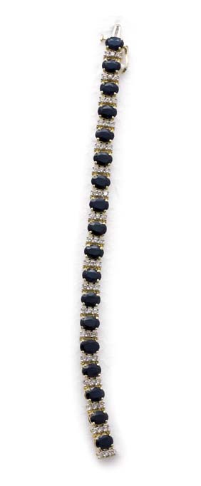 Appraisal: SAPPHIRE DIAMOND AND GOLD BRACELET Sapphire diamond and yellow gold