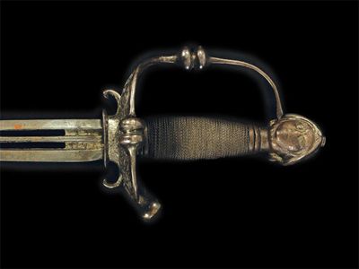 Appraisal: An early th century riding sword the blade with two