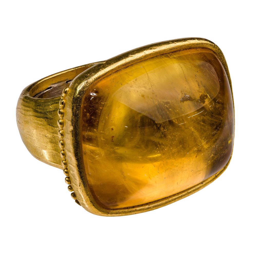 Appraisal: K YELLOW GOLD AND TOURMALINE RINGStatement ring having a mm