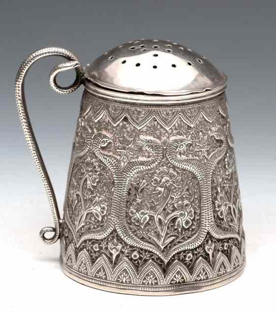 Appraisal: AN INDIAN SILVER SUGAR SIFTER of tapering form with embossed