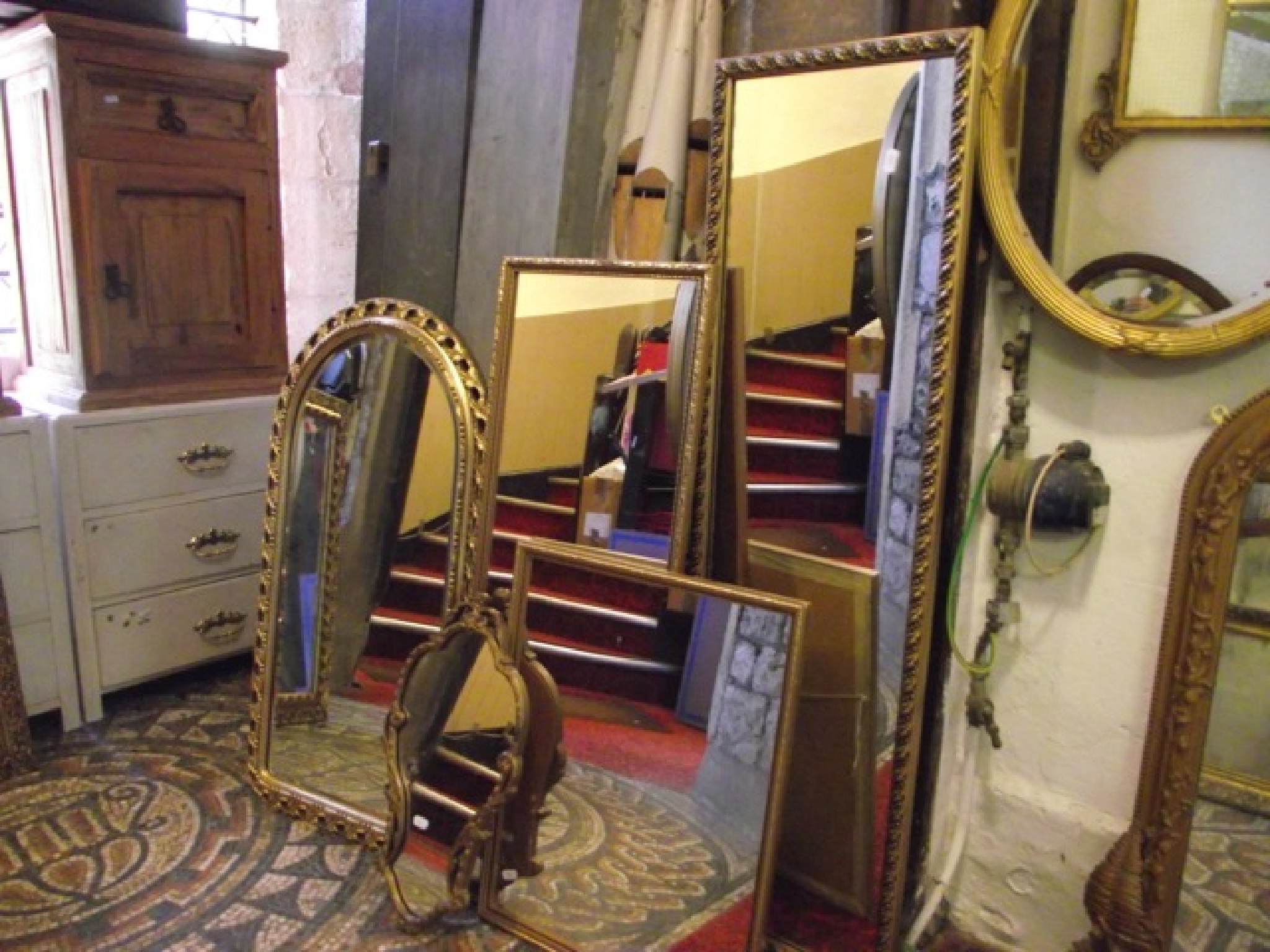 Appraisal: One lot of contemporary gilt framed wall mirrors of varying