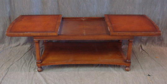 Appraisal: Leathertop Coffee Table with Extending Sides From a West End