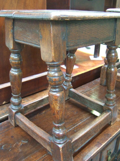 Appraisal: An th century style oak joint stool raised on block