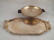 Appraisal: A circular silver plate fruit dish with mahogany handles and