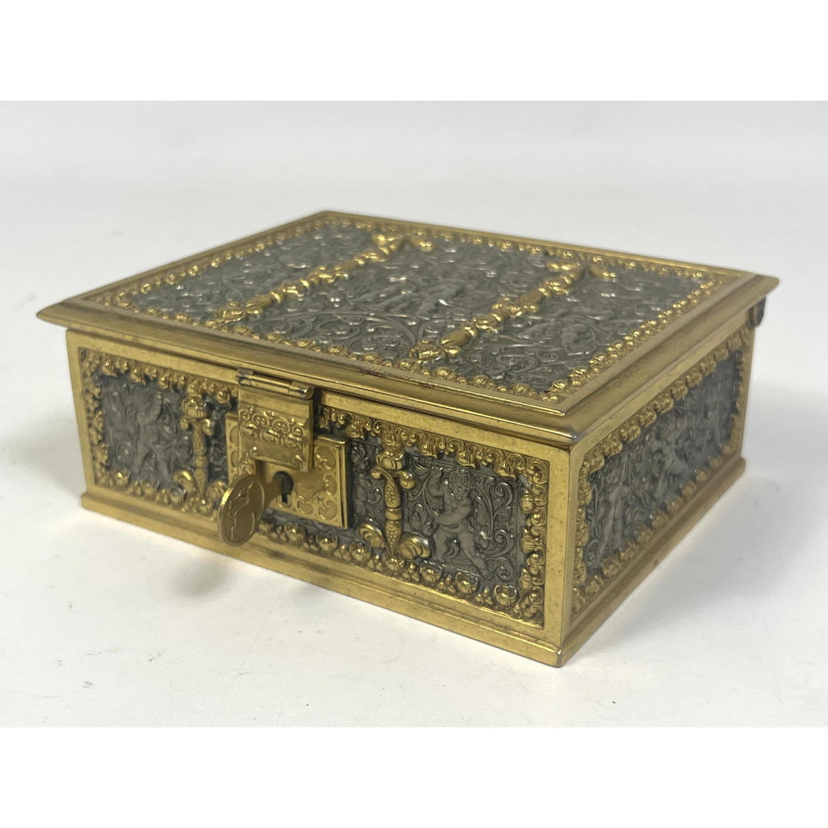 Appraisal: Erhard brass and silver metal embossed box with cherubs Blue