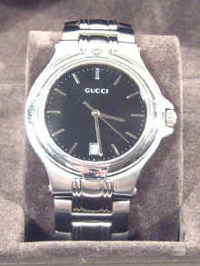 Appraisal: A stainless steel gents Gucci wrist watch in original fitted