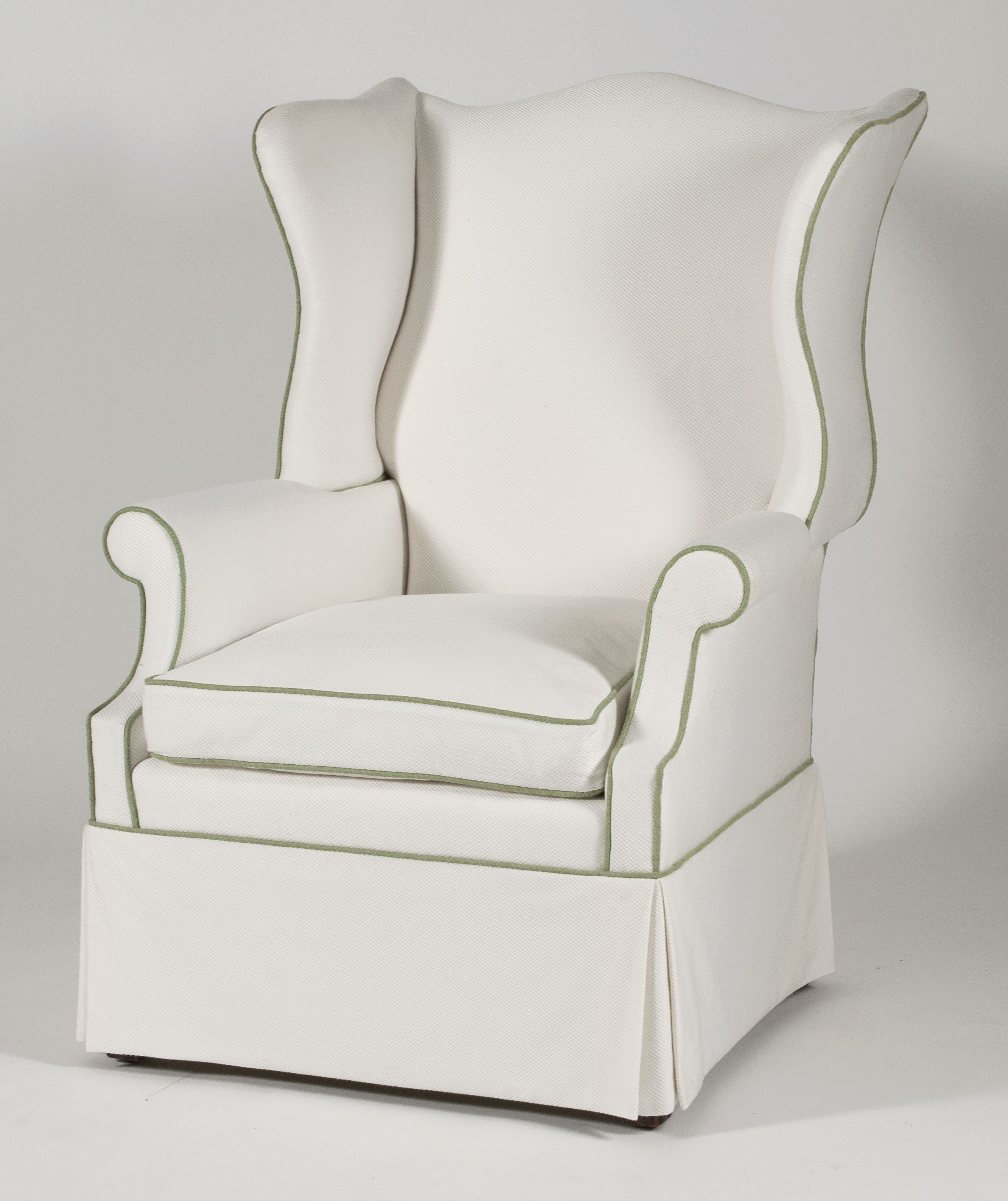 Appraisal: CHIPPENDALE-STYLE WING CHAIR With block molded front legs and H-stretcher