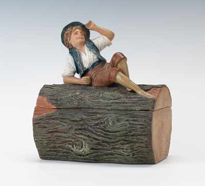 Appraisal: A Humidor Tobacco Humidor of Reclining Boy on Log Terracotta