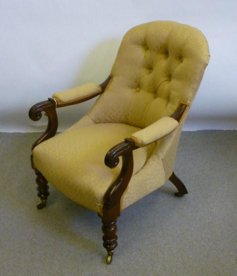 Appraisal: AN EARLY VICTORIAN ROSEWOOD ARMCHAIR button upholstered in gold damask