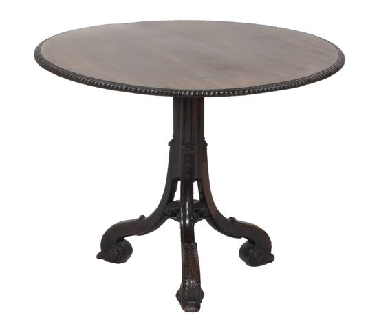 Appraisal: A George II and later carved mahogany tripod table the