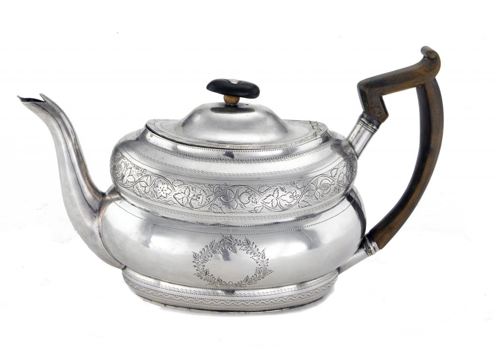 Appraisal: AN IRISH GEORGE III BRIGHT CUT TEAPOT of compressed oval